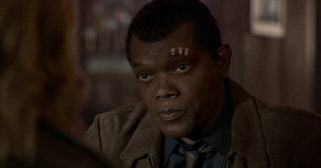 A digitally de-aged Samuel L. Jackson as Nick Fury.