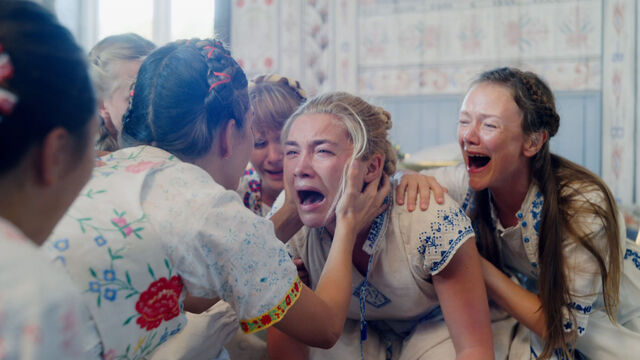 Florence Pugh (center) has a good cry in another memorable scene from Midsommar.