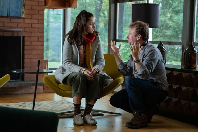 Rian Johnson directs Ana de Armas on the set of Knives Out.