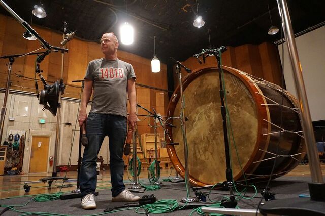 Tom Holkenborg with the bass drum used in the Godzilla vs. Kong score.
