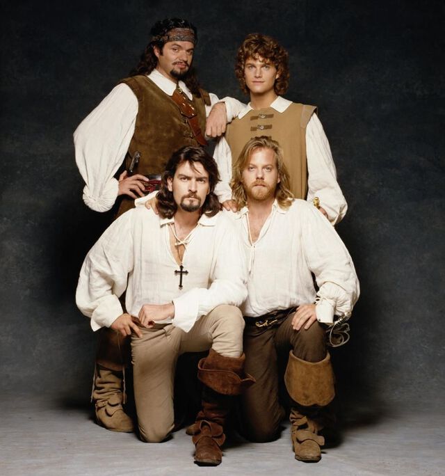 A publicity still from The Three Musketeers (1993) with Oliver Platt, rear left, as Porthos.