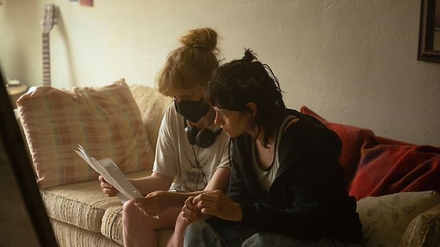 Rose Glass directs Stewart on the set of Love Lies Bleeding.