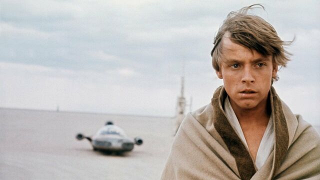 Star Wars (1977) had the droids a young Angus was looking for.