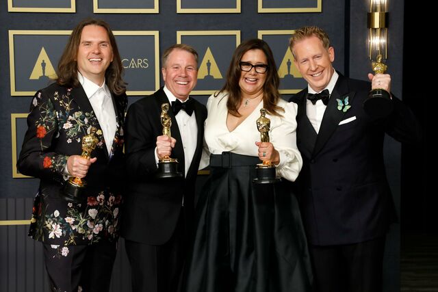 Yvett Merino with her fellow Animated Feature Oscar winners for Encanto (2021) at the 94th Academy Awards. — Photographer… Kathy Hutchins/​Alamy