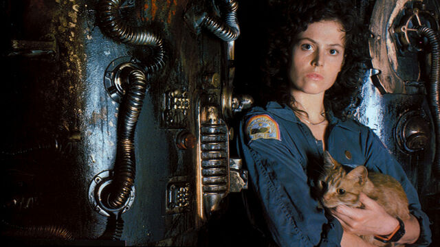 Alien series stars Ripley and Jonesy have a cuddle.
