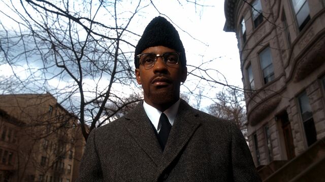 Denzel Washington portrays Malcolm X in Spike Lee’s 1992 biopic Malcolm X.