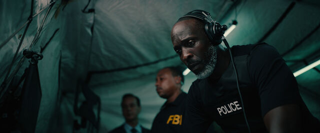 The late Michael K. Williams as police negotiator Eli Bernard in Breaking.