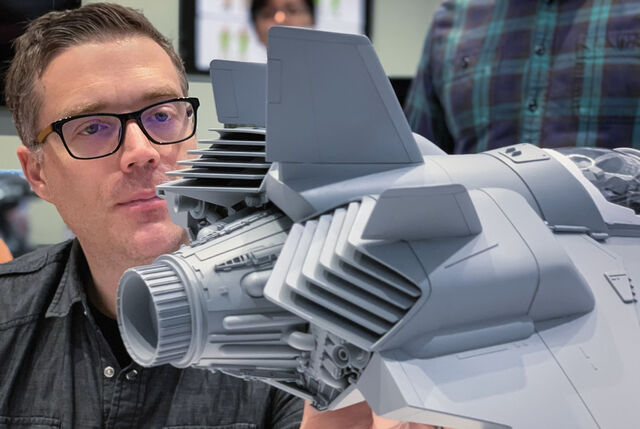 Lightyear director Angus MacLane with a model of Buzz Lightyear’s spaceship.