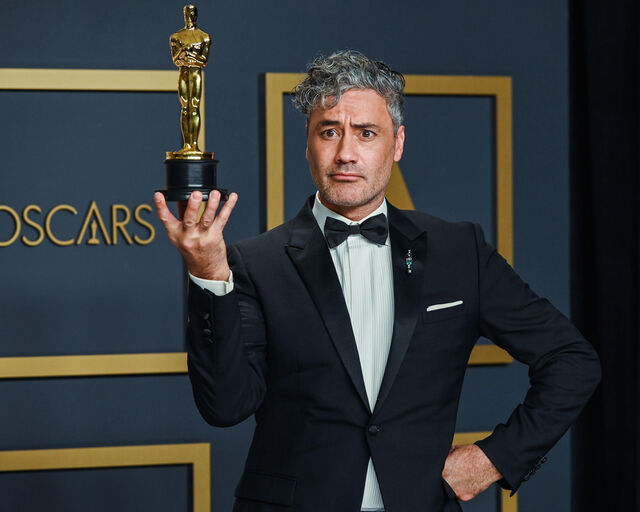Taika Waititi with his adapted-screenplay Oscar for Jojo Rabbit (2019). — Photographer… Anthony Behar/​Sipa USA