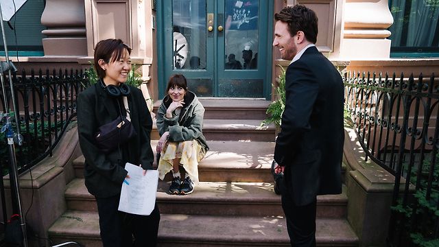 Celine Song, Johnson and Chris Evans on the Materialists set. — Photographer… Atsushi Nishijima/​A24