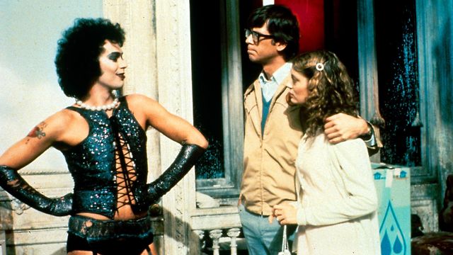 Dr. Frank-N-Furter about to rock Brad and Janet’s worlds in The Rocky Horror Picture Show (1975).
