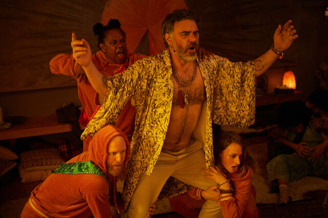 Bjorg (Jemaine Clement) encourages his followers (Ghenoa Gela, Byron Coll, Chelsie Preston Crayford) to reach maximum arousal. — Photographer… Kerry Brown
