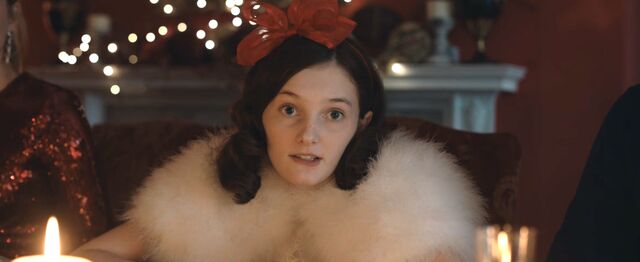 Davida McKenzie as Kitty in Silent Night, anxiously awaiting the sticky date pudding.